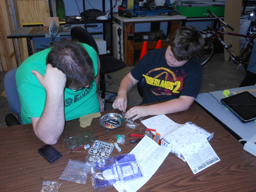 Ben and Alex working on a kit