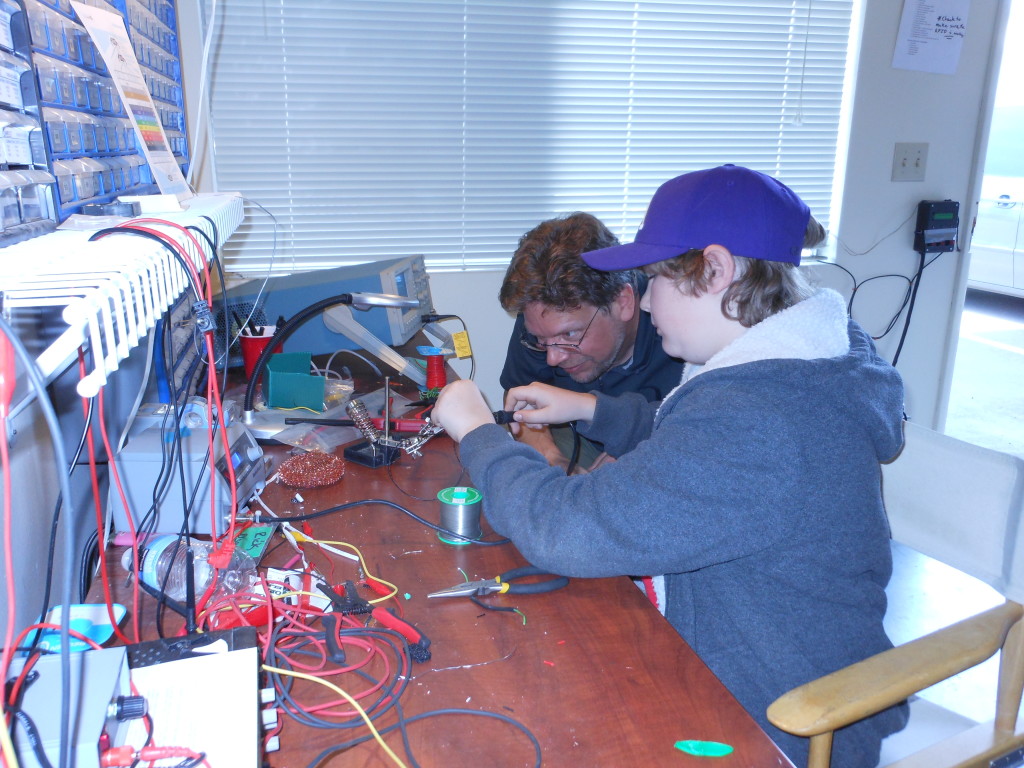 Quinn learns to solder