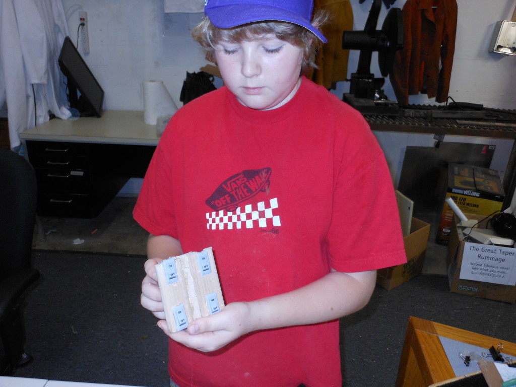 Quinn shows off the remote